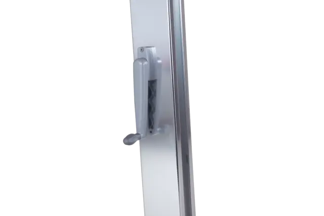 A detailed view of the ergonomic hand-crank mechanism on the Aman commercial umbrella, used for easily opening and closing the canopy.