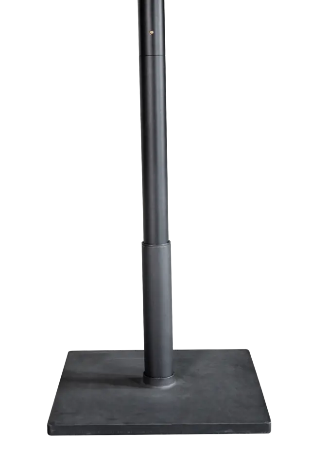 A close-up of the heavy-duty, dark grey square base designed for the Istanbul center pole commercial umbrella, providing excellent stability.