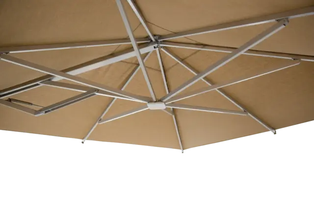 A detailed view from below the M2 Maximus canopy, highlighting the mechanical system and strong ribs that provide tension and stability to the dual shades.