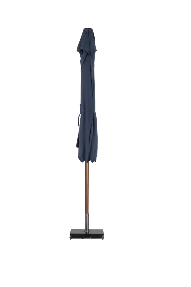 A closed Piazza center pole square market umbrella covered with a protective navy cover, standing on a square base.