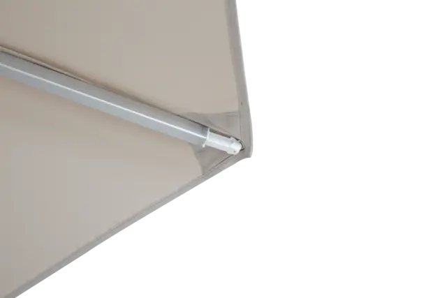 A detailed macro shot of the corner of the Easy Life I market umbrella canopy, showing the reinforced stitching and durable pocket for the support rib.