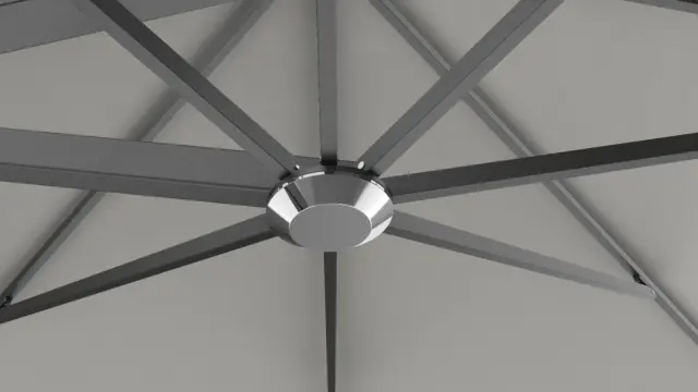 An underneath close-up view of the central hub where the V1X umbrella ribs connect, showing the internal structure and a central cap.